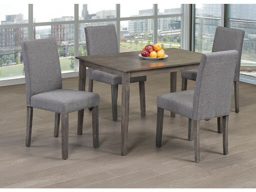 A 5-piece dining room table and chair set with wood accents and grey upholstery