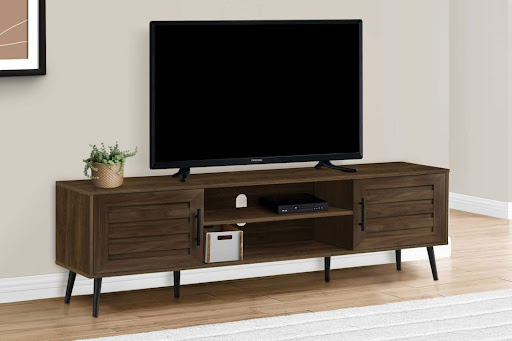 The media centre offers multiple storage spaces and enough room for a medium-sized TV on top