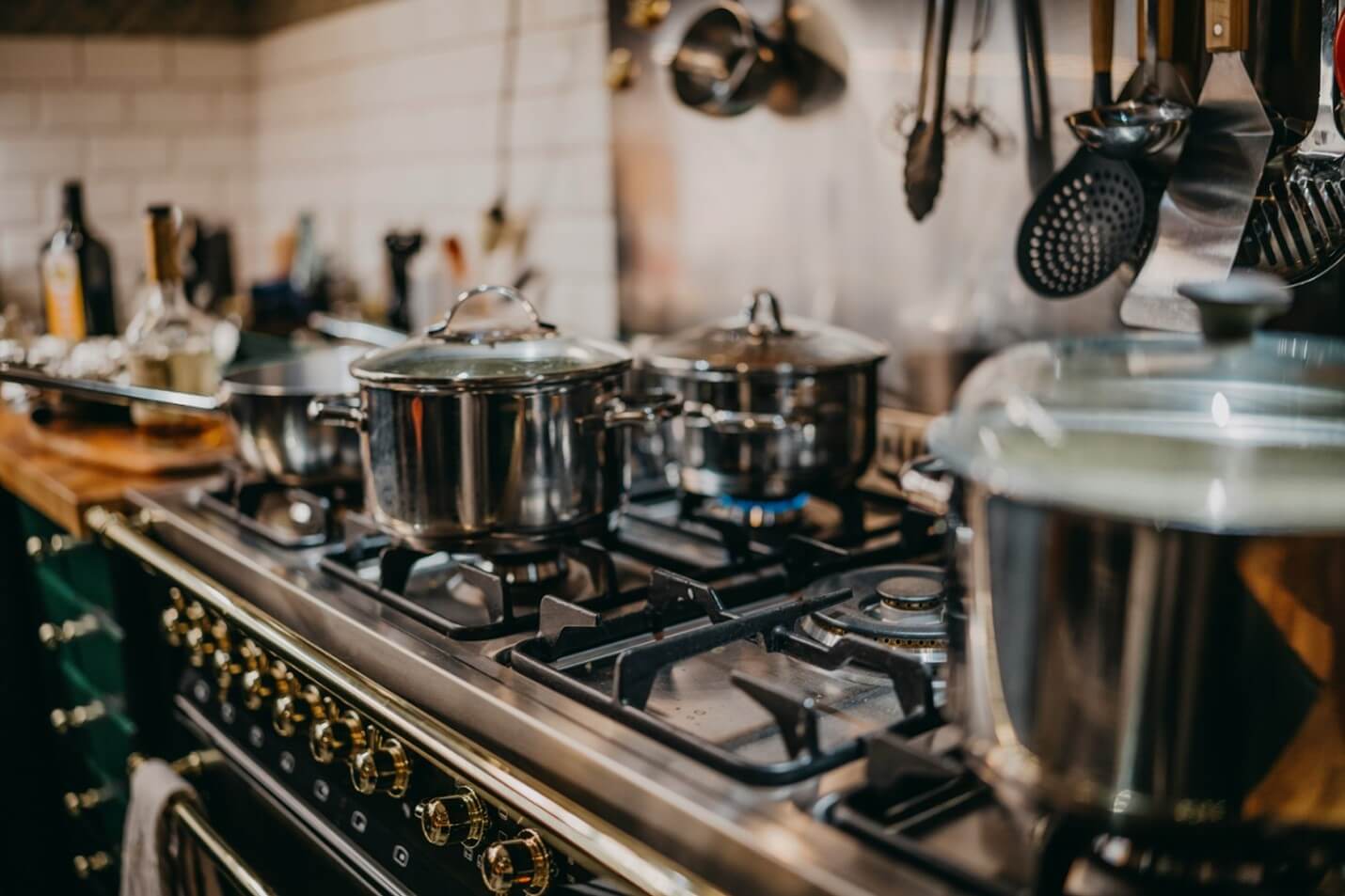 A few pots on a stove’s open burners