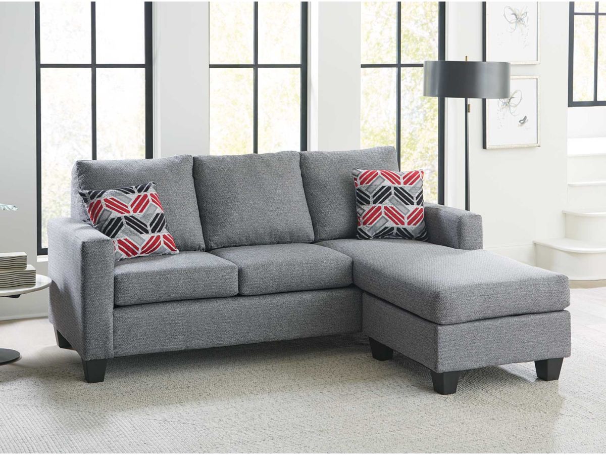 A light grey couch with chaise in a bright living room
