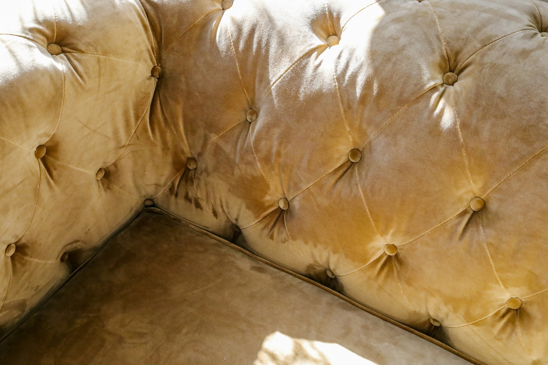A close-up of the material on a recliner sofa