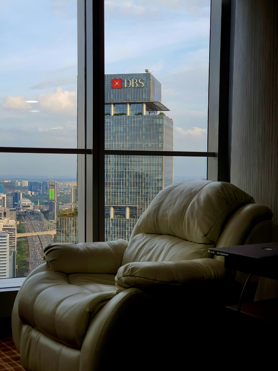 A person relaxing in a recliner chair