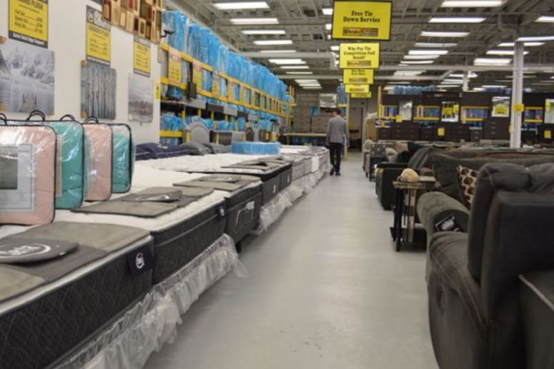 Surplus Furniture store with items on display