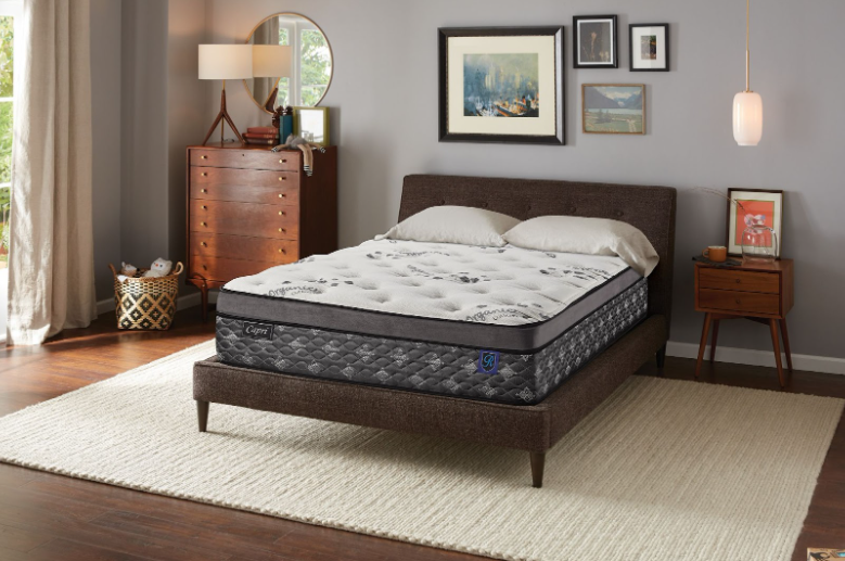 Mattress configured for stomach sleepers