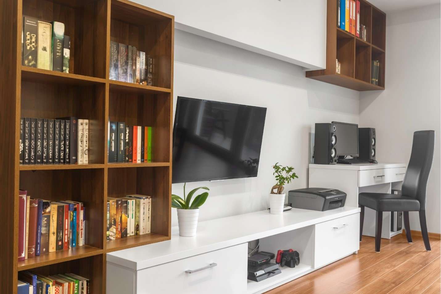 Corner bookshelves on a living-room wall