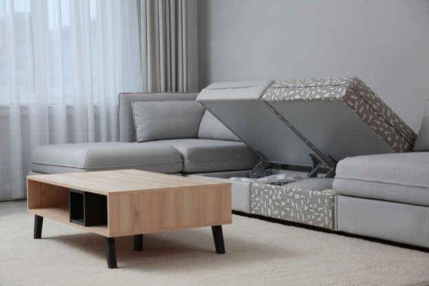 Multifunctional living room furniture with under-cushion storage