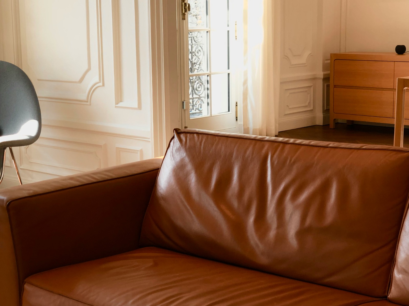 A bright living room with a comfortable sofa